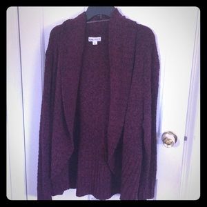 Fuzzy maroon and black knit cardigan.